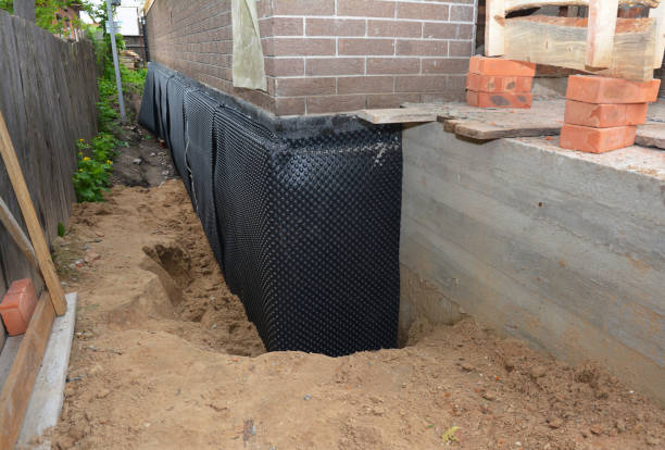 SJ Waterproofing Pros technician performing targeted Foundation Crack Repair assessment in Bluffton, IN